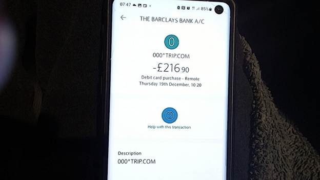 A cell phone with a screen showing a number of money

AI-generated content may be incorrect.