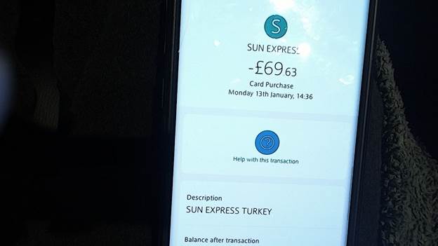 A close-up of a phone

Description automatically generated